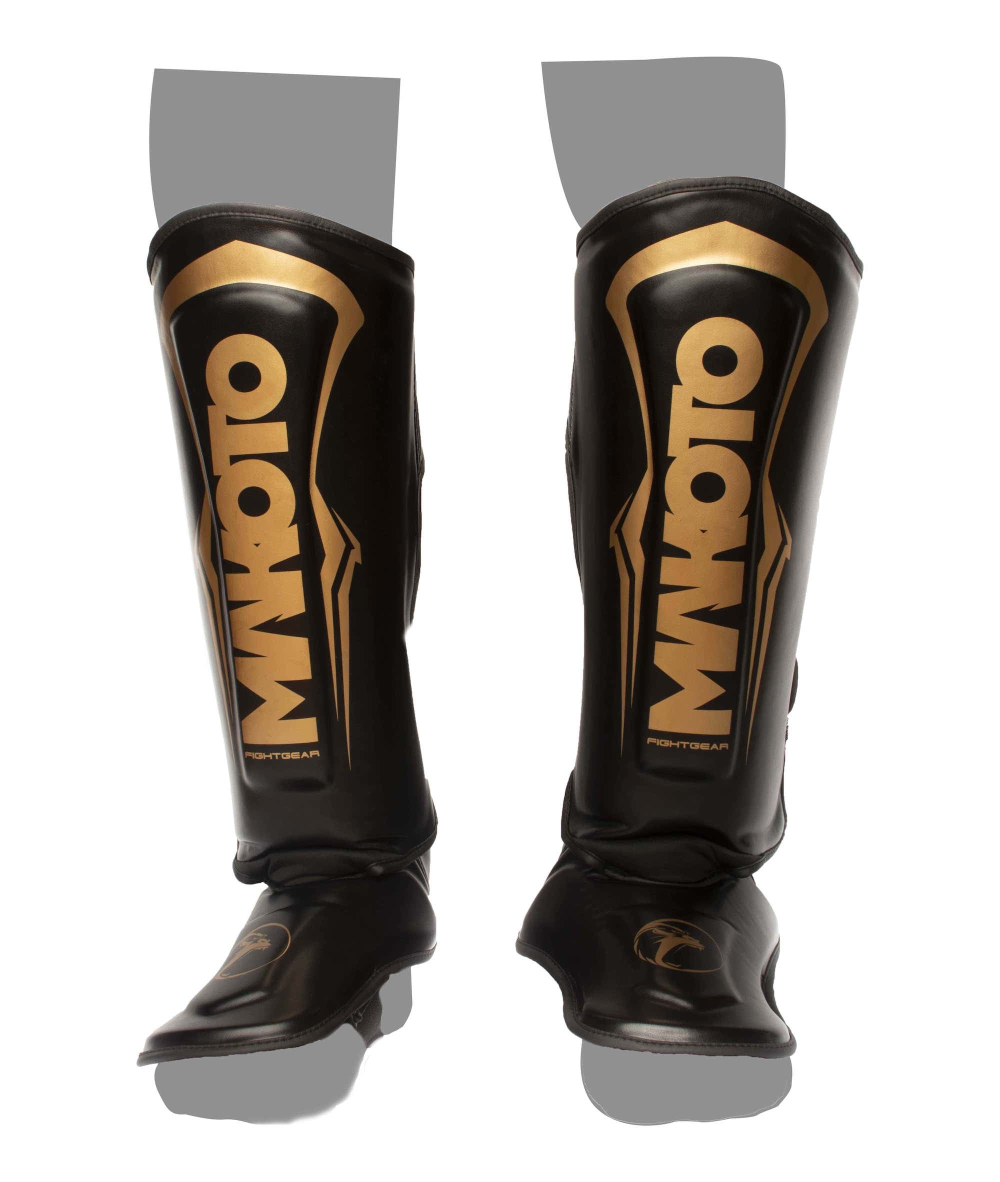 Canilleras de Muay Thai Makoto M1 Negro/Dorado - 100% Poliuretano