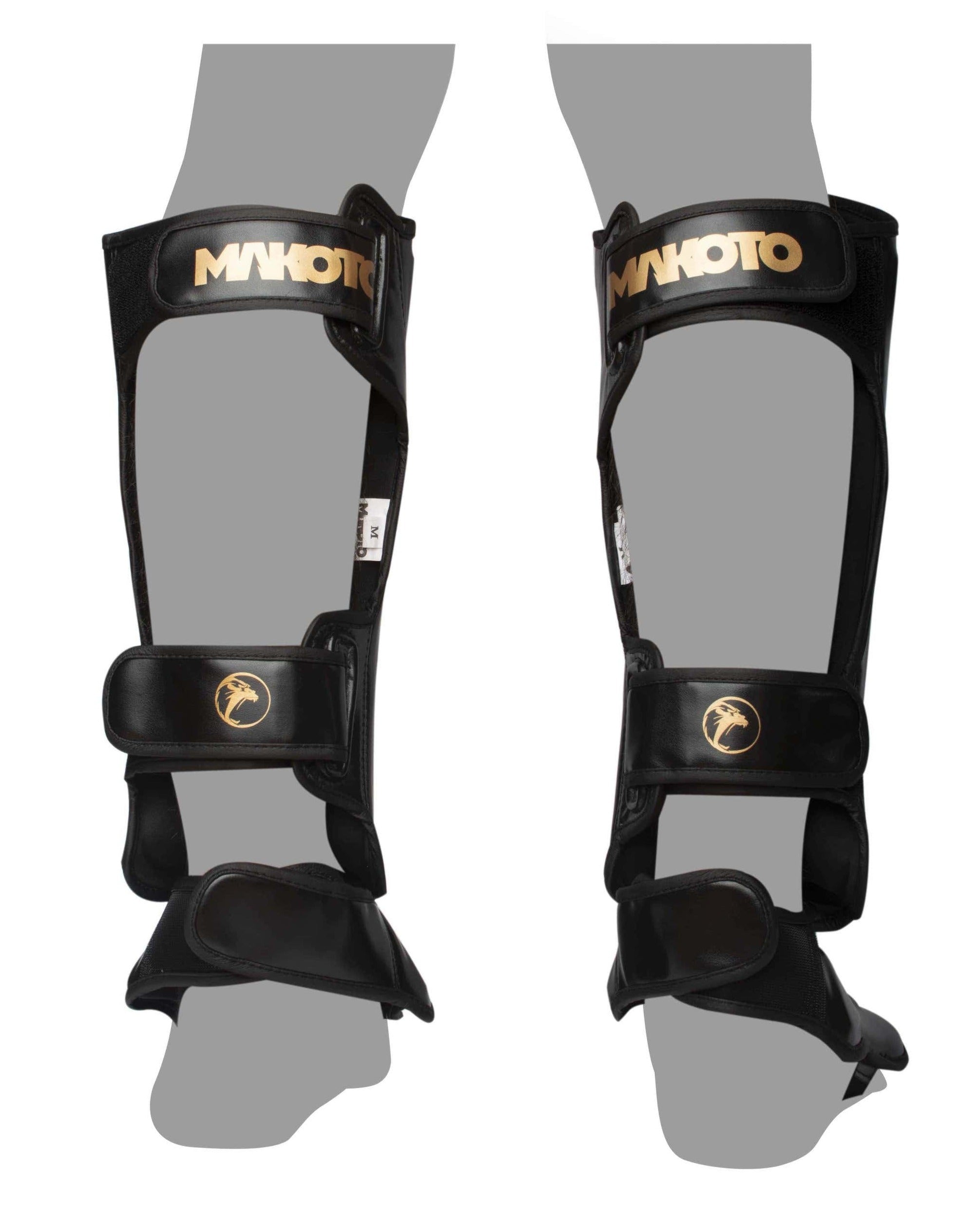 Canilleras de Muay Thai Makoto M1 Negro/Dorado - 100% Poliuretano