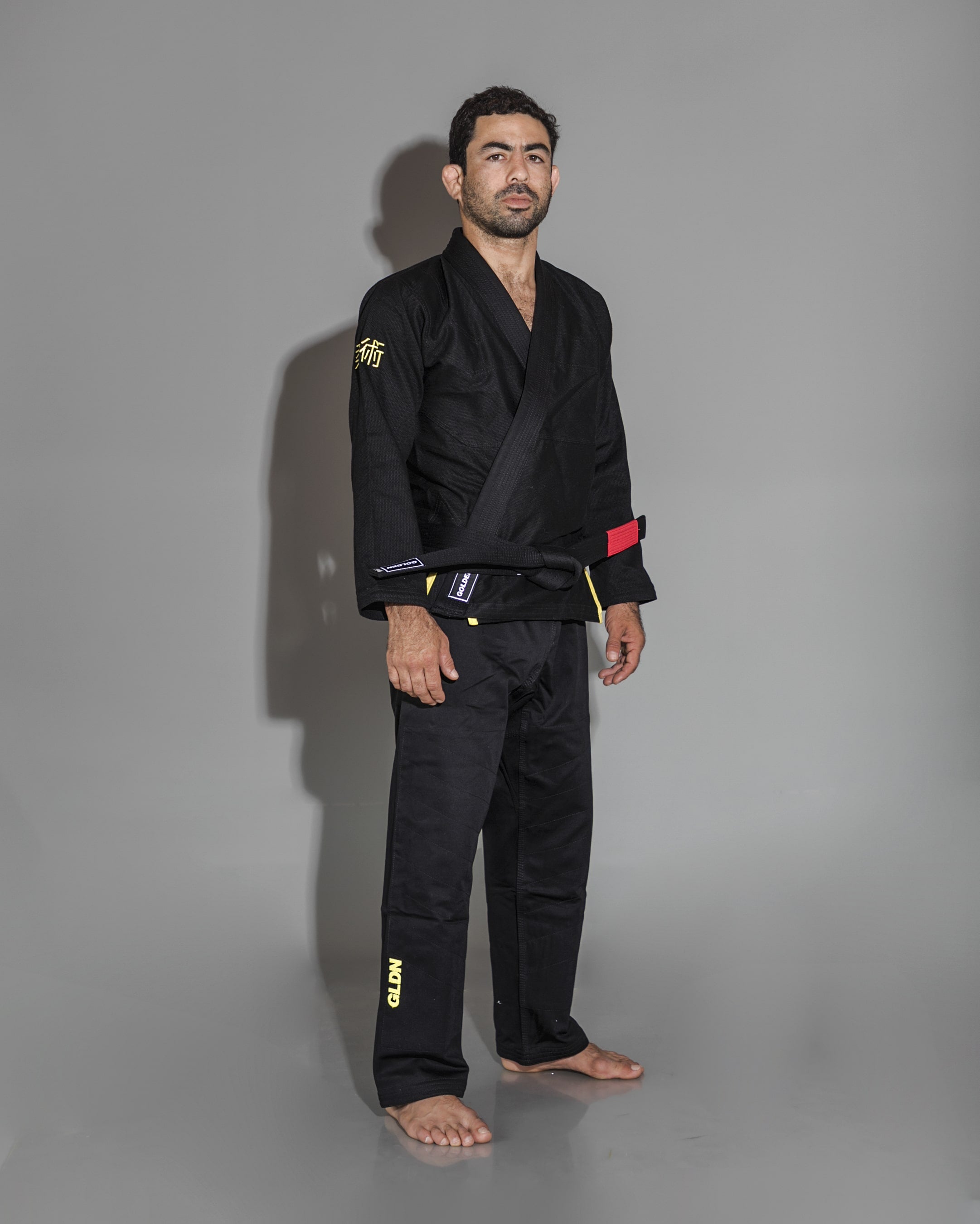 Kimono de Jiujitsu Golden Kids Light Negro/Amarillo- 100% Algodón